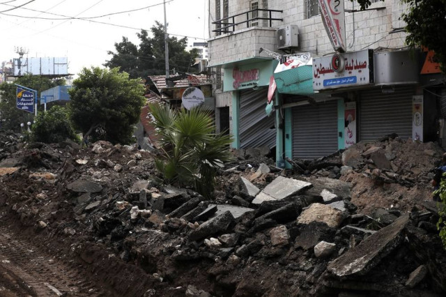 A view of rubble on the street after Israeli bulldozers destroyed streets and shops on the fifth day of an Israeli military operation in the West Bank city of Jenin, 01 September 2024